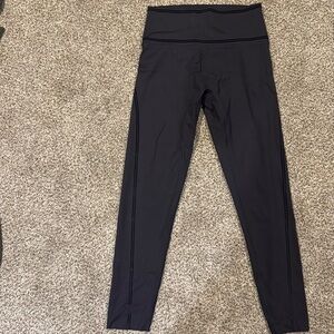 Aerie black leggings with velvet stripe. Size large.